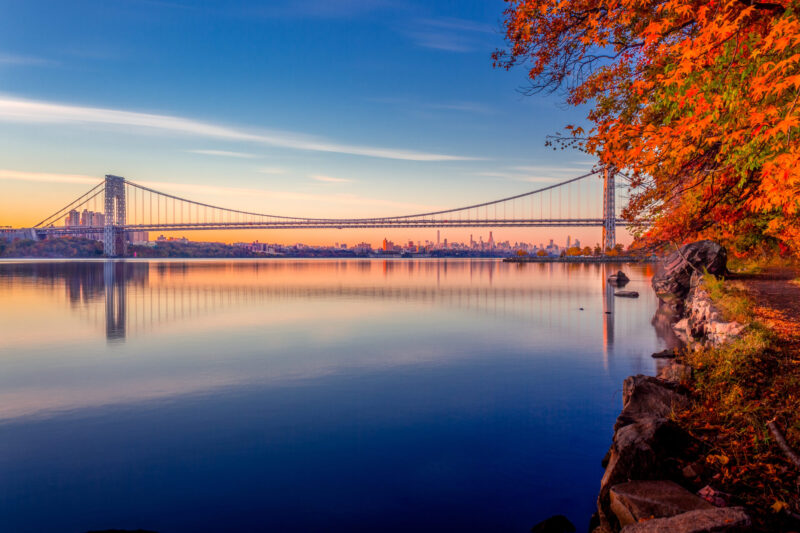 George Washington Bridge and midtown Manhattan at sunrise in the Fall